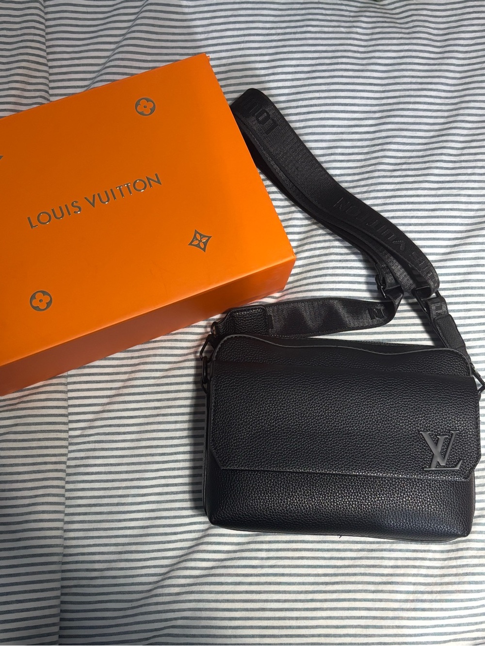 Louis Vuitton Black Men’s Textured Leather Messenger Bag with LV Emblem